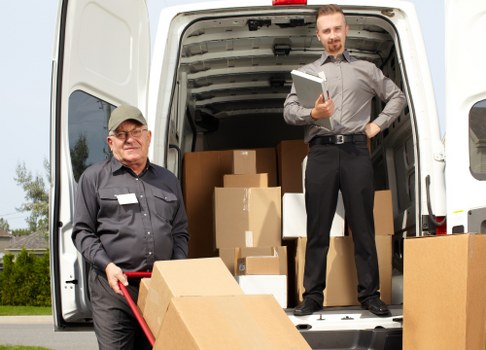 Local removals van helping with access and parking in Customhouse