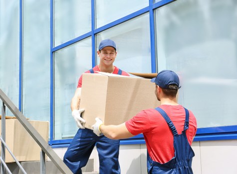 Removal team preparing for a residential move in Customhouse