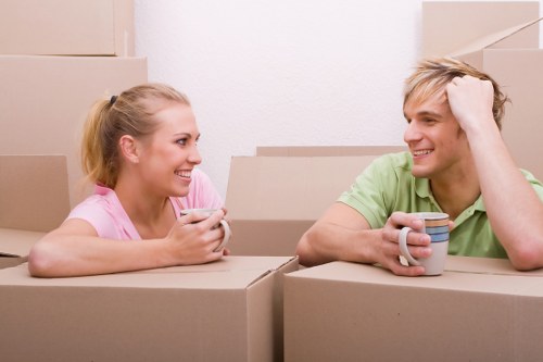 Packed boxes and moving van for a local Customhouse removal job