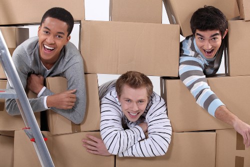 Packed household boxes ready for a Customhouse home removal