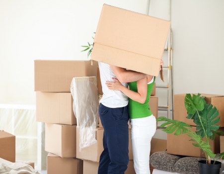 Packed boxes and household items ready for a Customhouse move