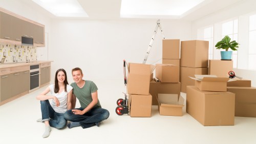 Customhouse office relocation preparation with labeled moving boxes