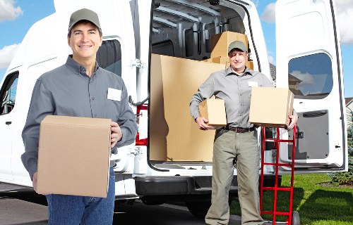 Local packing team organizing boxes for a Customhouse property move