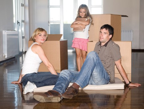Local movers loading furniture near Customhouse residential flats